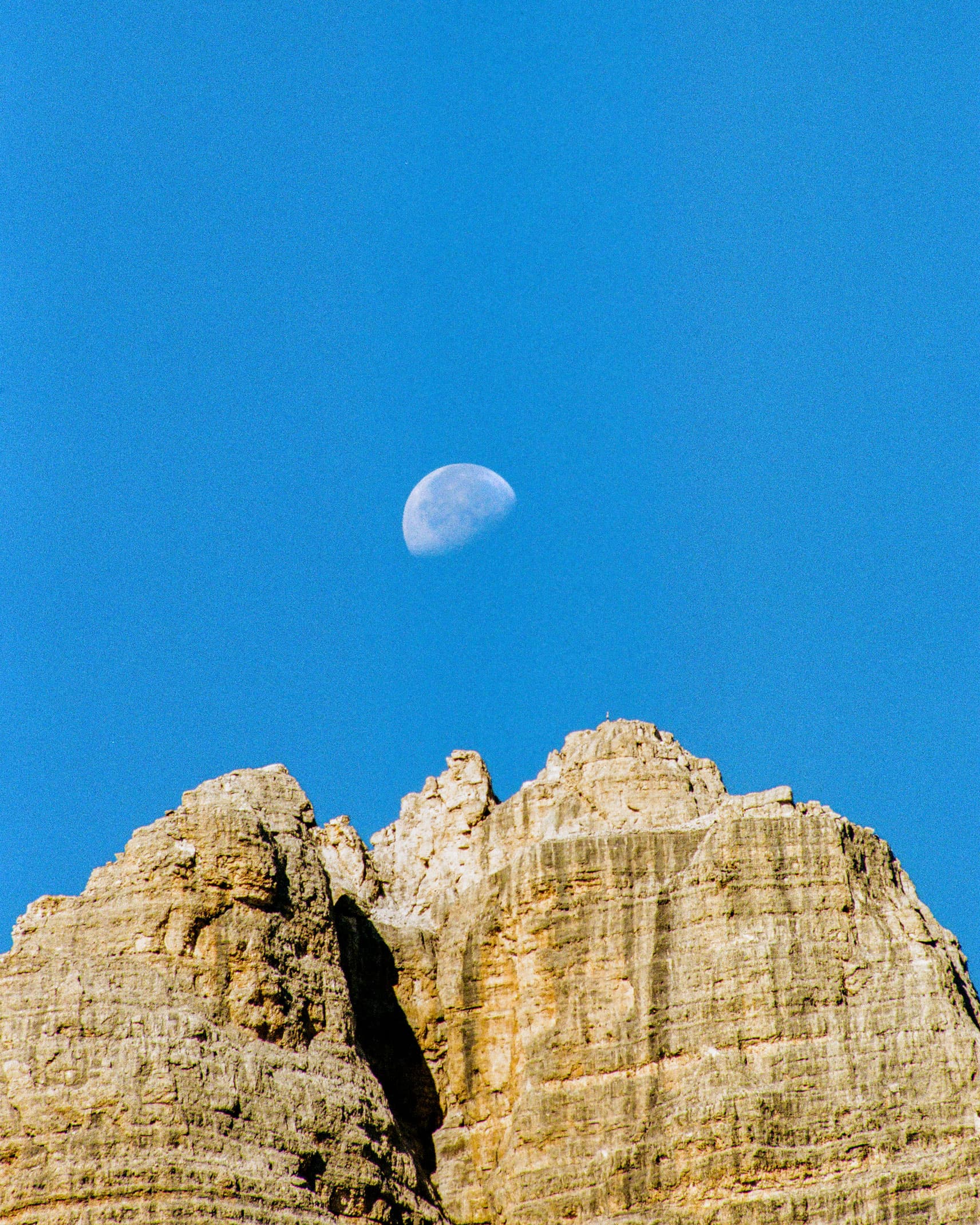 Clear moon over looking over the mountain top